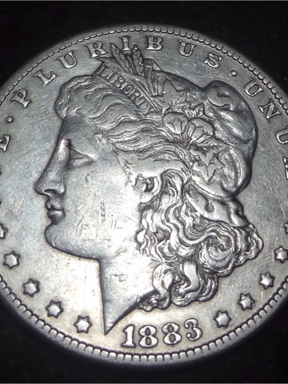 1883-CC Morgan Silver Dollar - Solid XF details from the Carson City Mint